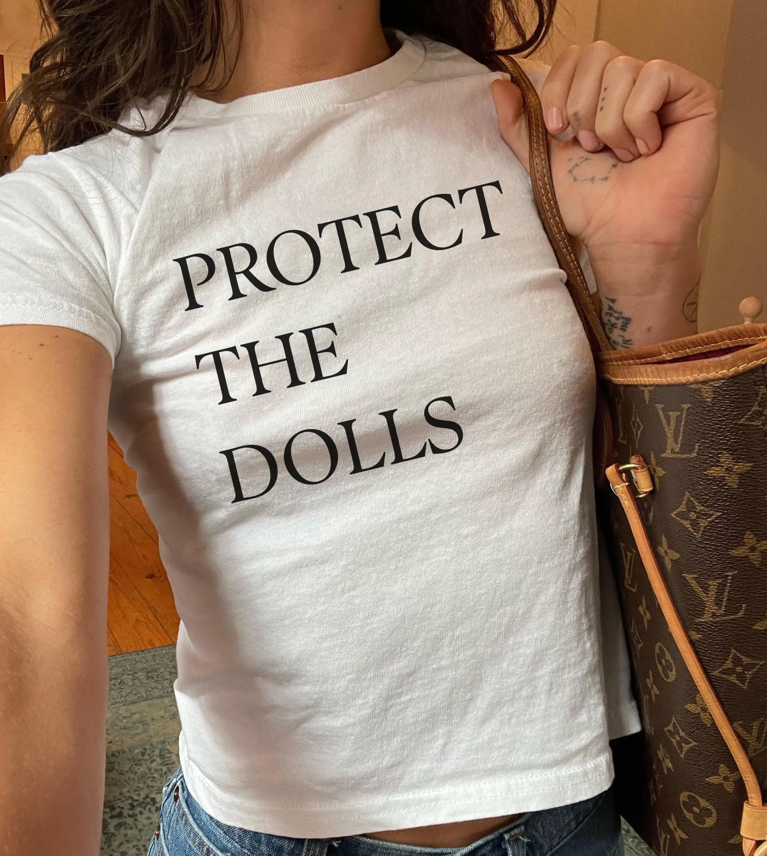 Protect The Dolls Baby Tee Feminist T-shirt Pride Shirt Gender Equality Viral Baby Tshirt Human Rights Activist Top Trans Rights Shirt