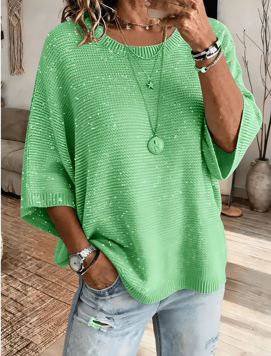 Bohemian-style glitter sequin round-neck knit sweater for women, featuring a loose-fitting, off-the-shoulder batwing silhouette, three-quarter sleeves, a relaxed pullover design, breathable texture, and a solid color that enhances the slimming