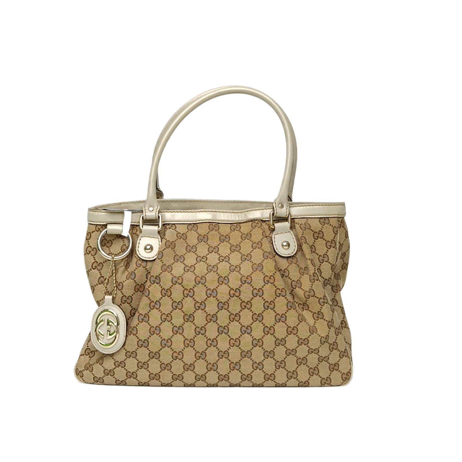 Pre-owned GUCCI leather Tote Bags Old fashioned canvas bag with a light gold buckle and a handbag design.