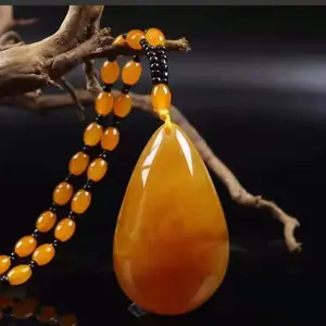 High-end long necklace with amber pendant