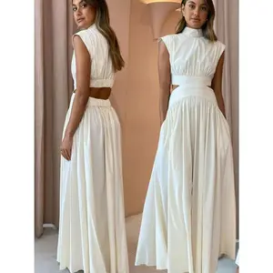 A new solid color, fashionable, slimming, sleeveless, stand-up collar, exposed waist, pleated, large-swing long dress for export in 2025