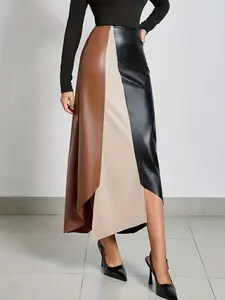A fashionable color blocked irregular leather skirt for women, suitable for commuting, shopping, and outdoor wear