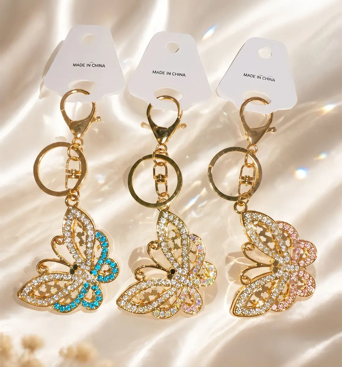 Elegant Butterfly Keychain with Rhinestones - Gold Tone, Blue, Pink, and Clear Colors, Made in China
