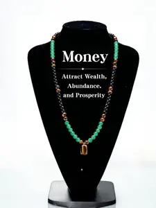 This auspicious necklace, set with a green aventurine and tiger's eye pendant and infused with healing crystals, is perfect for anniversaries, vacations, and themed parties, making it an ideal gift for friends and family. generous cry Statement Necklace