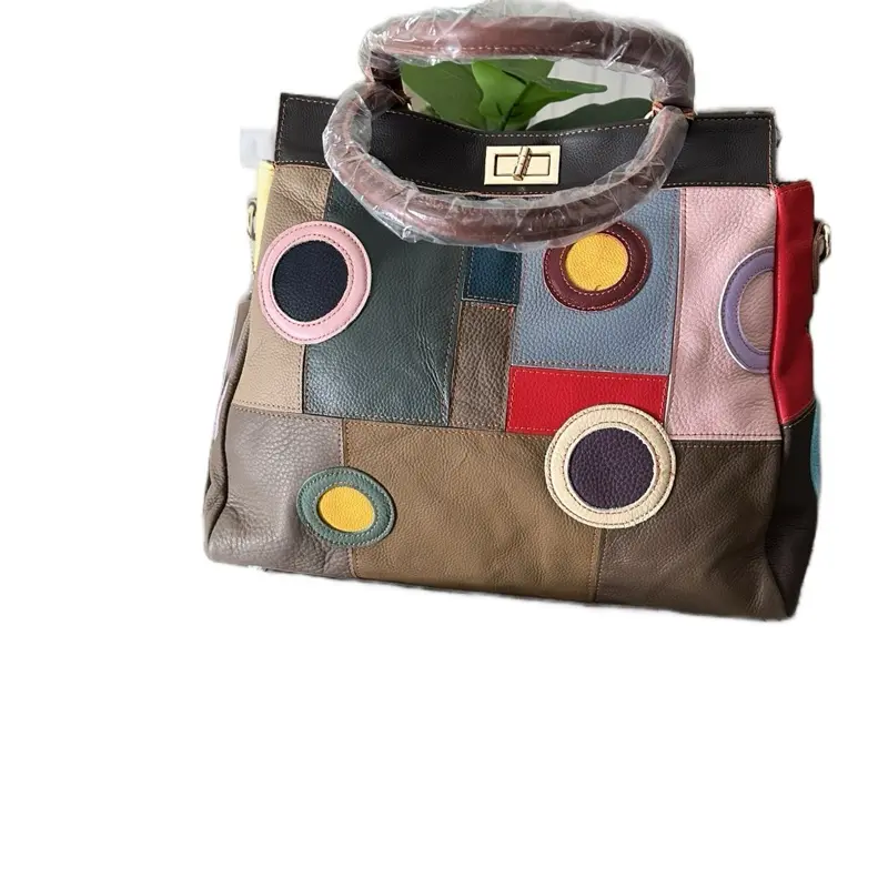 Multicolor Leather Handbag with Colorful Circular Designs and Gray Handles