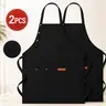 Upgrade Your Kitchen with a 2-Pack of Black Aprons. Features adjustable neck ties, a handy pocket, and a comfortable fit for cooking, baking, or grilling.