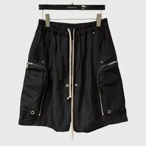 Dark functional fashion cargo shorts for men featuring large zipper pockets, drawstring, and studs; street and outdoor casual shorts made from comfortable polyester fabric #SummerWins