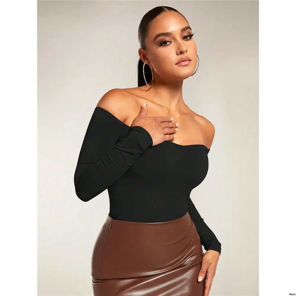 One off the shoulder top with ribbon down the side ahein - TikTok Shop