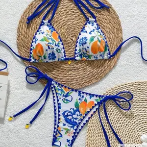 Tropical Orange String Bikini with Blue Trim and Orange Fruit Print Design