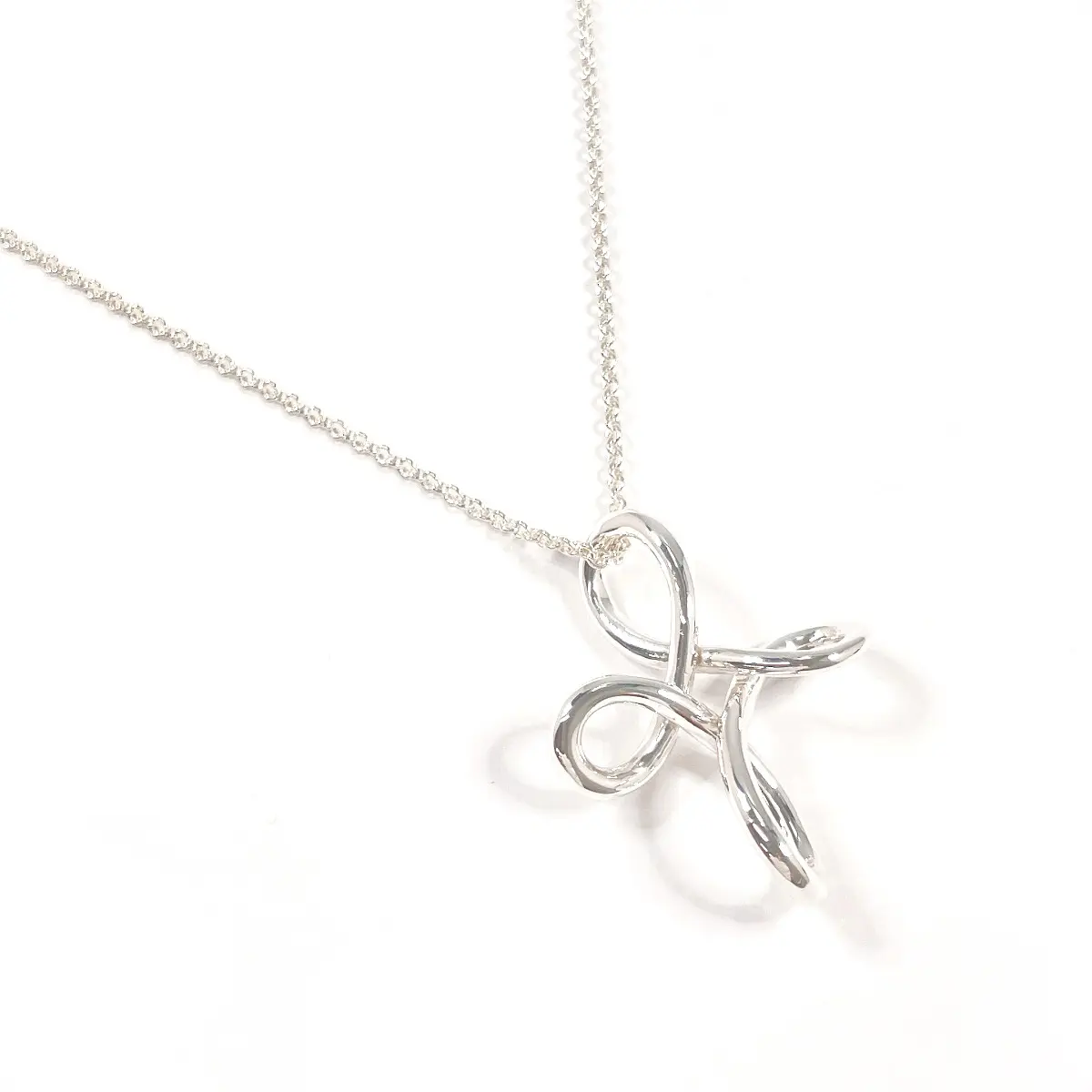 Pre-owned Tiffany & Co. Sterling Silver 925 (Ag925) Small Leather Goods Infinity Cross Silver Necklace