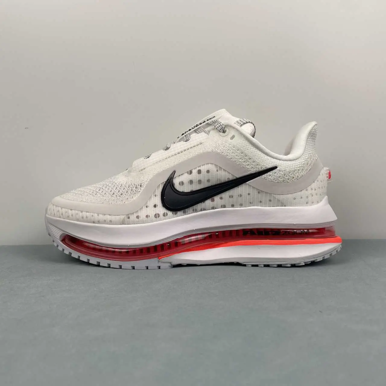 Off‑white with lime‑green accents low‑cut athletic running sneakers, premium breathable knitted mesh construction, air‑cushioned durable rubber outsole, ideal pick for sport‑focused daily casual fits