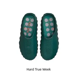 Deep forest green slip-on rubber slide clogs with wavy scalloped edge, perforated hollow toe panel and polka dot padded insole. Waterproof soft rubber texture fits beach trips, pool days and outdoor camping activities perfectly.