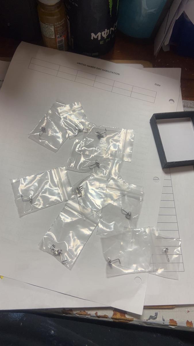 Item: Silver Red Nose Rings