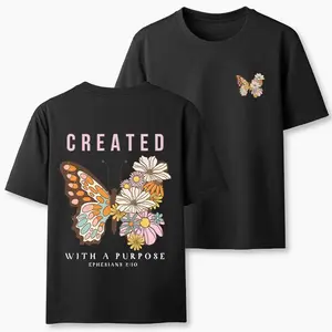 "Created for a specific purpose" Double-sided printed loose-fitting T-shirt, made of soft, breathable, and comfortable pure cotton, featuring a retro Christian butterfly and wildflower print. A Bohemian aesthetic inspirational Bible verse T-shirt