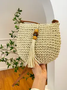 Women's Hollow Woven Straw Bag, Essential Beach Accessory for Vacations & Holidays, Fashionable Summer Straw Sandbag with Tassel Pendant