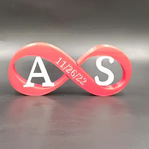 Personalized infinity symbol with custom initials and text