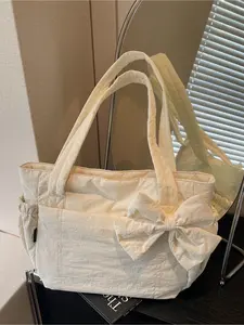 New Sweet Minimalist Off-White Quilted Bow Lightweight Work Tote Bag Large Capacity Women's Bag with Side Pockets Perfect for Daily Commutes, Dates, and Everyday Carry