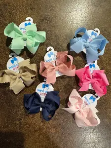 Medium Scalloped Edge Bow on a Clip