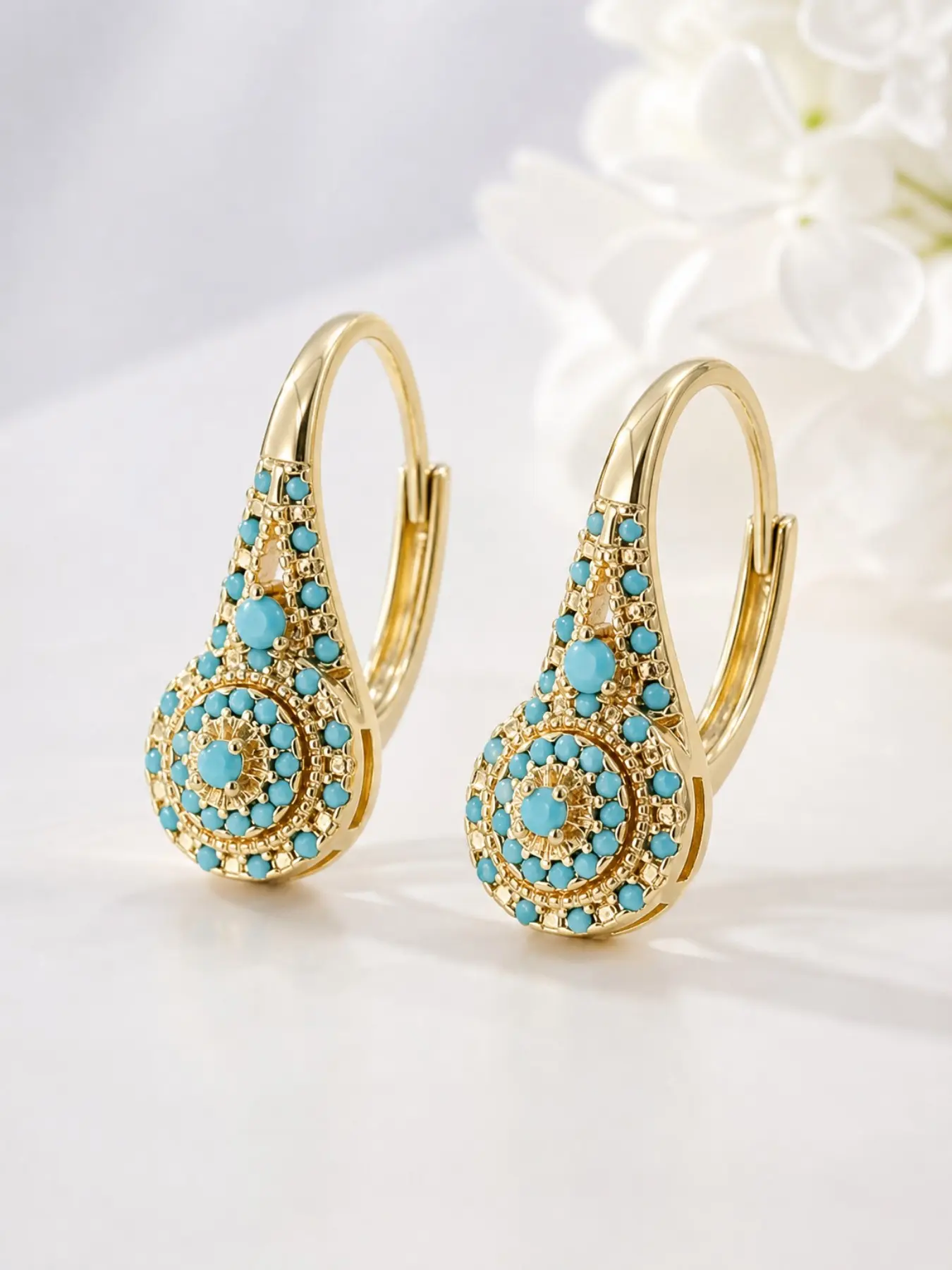 These synthetic turquoise teardrop-shaped pendant earrings, Fashionable earrings, for everyday and formal occasions, make a great Valentine's gift, affordable, luxurious, elegant, meticulously crafted, High Quality Earrings