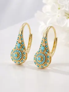 These synthetic turquoise teardrop-shaped pendant earrings, Fashionable earrings, for everyday and formal occasions, make a great Valentine's gift, affordable, luxurious, elegant, meticulously crafted, High Quality Earrings
