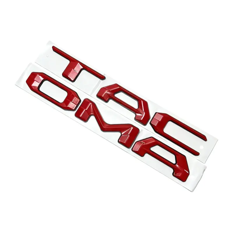 Toyota Tacoma truck emblem stickers for 2024–2025, including lettering decals for the rear tailgate