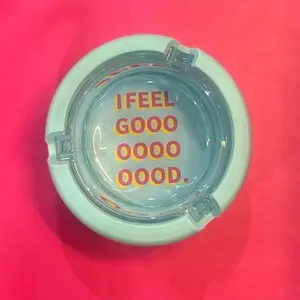 glass ashtray with plastic cover