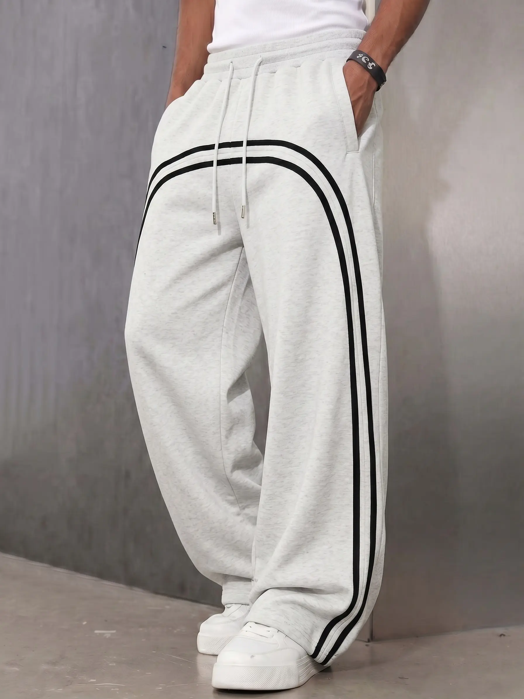 Men’s classic sporty cotton-blend striped wide-leg sweatpants with an elastic drawstring waist and side pockets; durable casual athletic pants that are versatile for everyday wear—suitable for work, travel, fitness, home leisure, and street style.