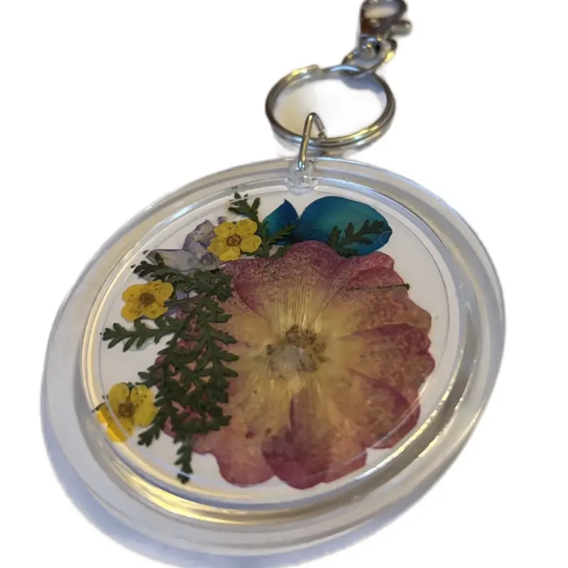 Dried Flower Keychain - Circular Design with Colorful Pressed Flowers and Greenery Accents