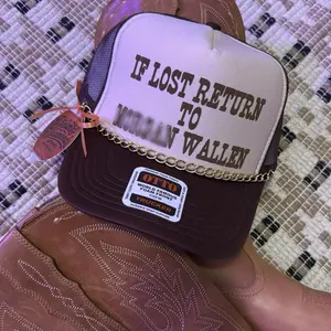 “If lost return to” Trucker Hat