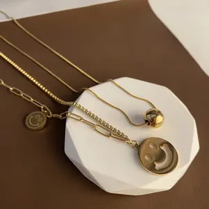 Hollow pendant necklace women's simple retro size smiley face titanium steel smile collarbone chain jewelry