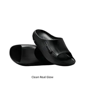 Sleek matte black slide sandals made of soft waterproof foam. Cushioned spiral footbed plus anti-slip grip for all grounds. Lightweight unisex slides, fast-drying