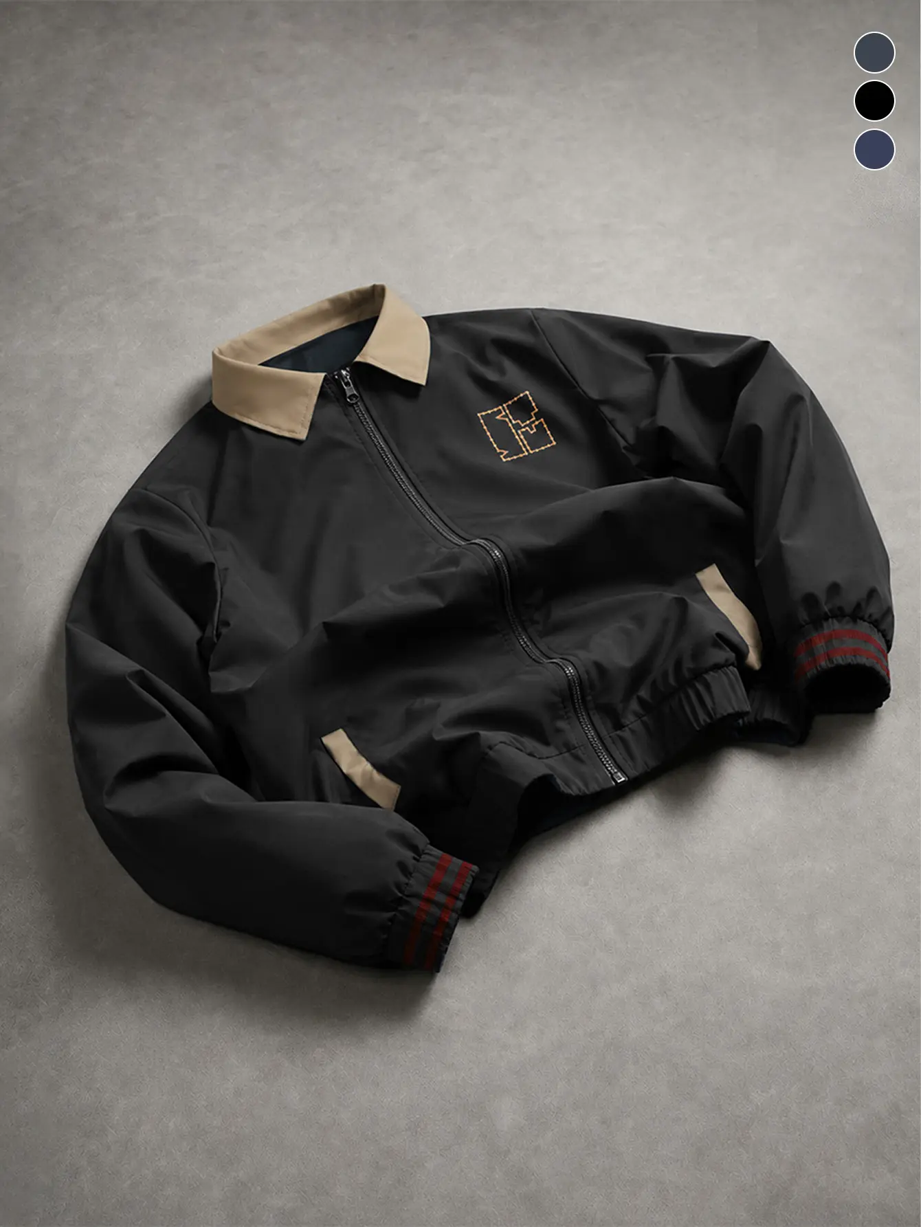 Men’s pilot jacket with a turn-down collar, embroidered stripes with a boxy silhouette, ribbed cuffs, and a loose vintage collegiate style—casual outerwear for campus and street wear.