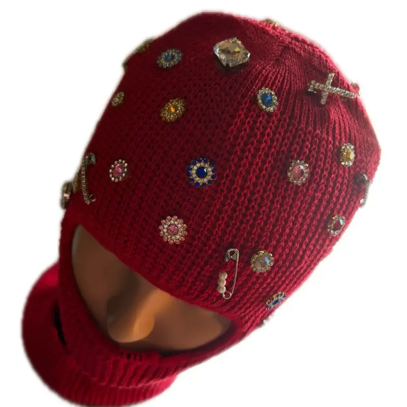 Red Ski Mask Hat Bejeweled with Colorful Embellishments and Unique Design Elements
