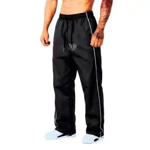 Men’s loose athletic pants with white stripes, ice silk feel, elastic waistband, elastic drawstring cuffs, versatile styling options—ideal for gym workouts #SummerVibes