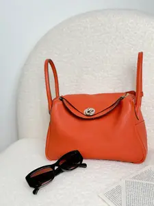 Pre-owned HERMÈS Lindy 26, Flame Orange, Silver Hardware, Epsom Leather, X Stamp HK