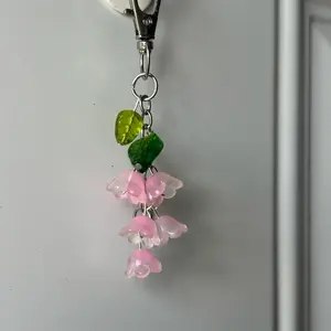 Charming Pink lily of the valley Flower Keychain with Green Leaf Accent for Stylish Accessories