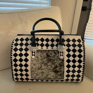 Large Checkered Speedy Bag with Cowhide Accents and Durable Design
