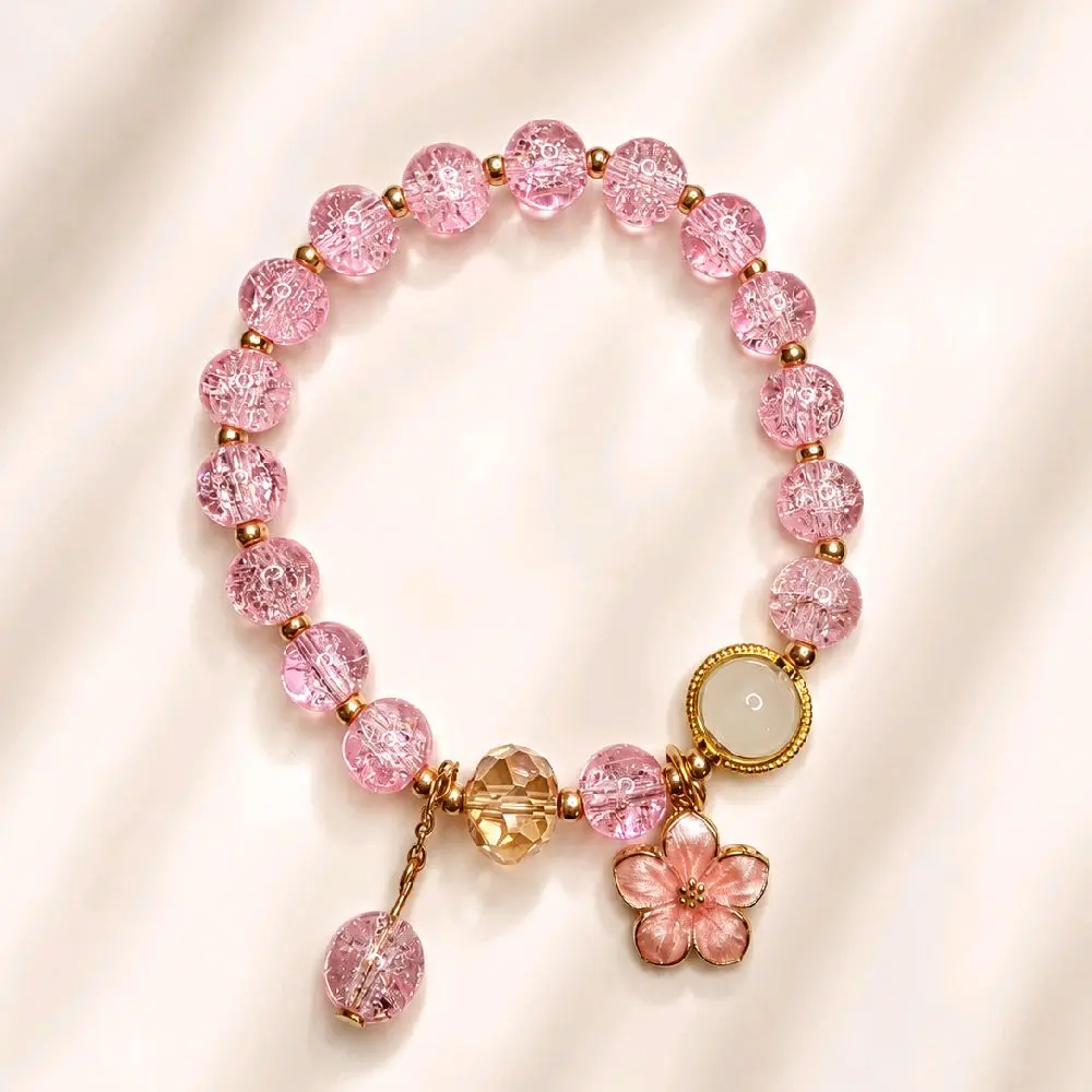 Pulsera Artesanal de Cristal Craquelado con Dije Floral