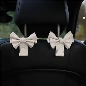 2 Pack Car Purse Hooks, Cute Bow Car Seat Headrest Hook Hanger for Purses and Bags. (white)