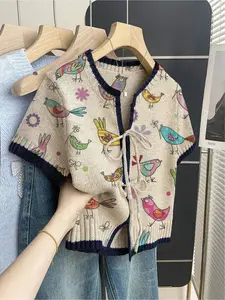 Women's khaki bohemian vacation short-sleeve knit top. Loose round neck, contrast cartoon bird print, front tie and contrast piping. Comfortable for spring & summer casual wear. Womenswear