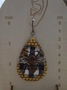 Faux leather bee plastic dangly earrings
