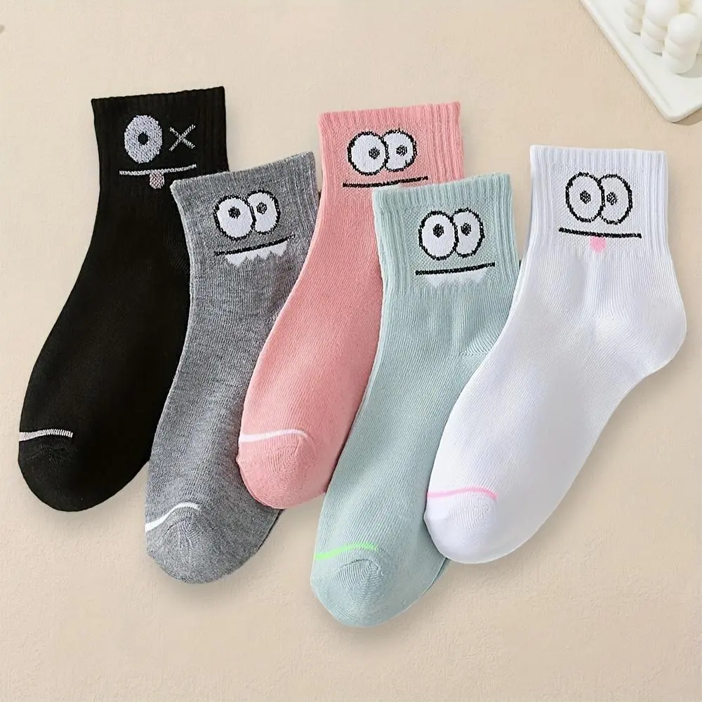 5 pairs womens cartoon expression boat socks featuring funny one eyed smiling and surprised face designs soft breathable short socks machine washable cute fun casual wear peculiar fabric durable material essential for collectors