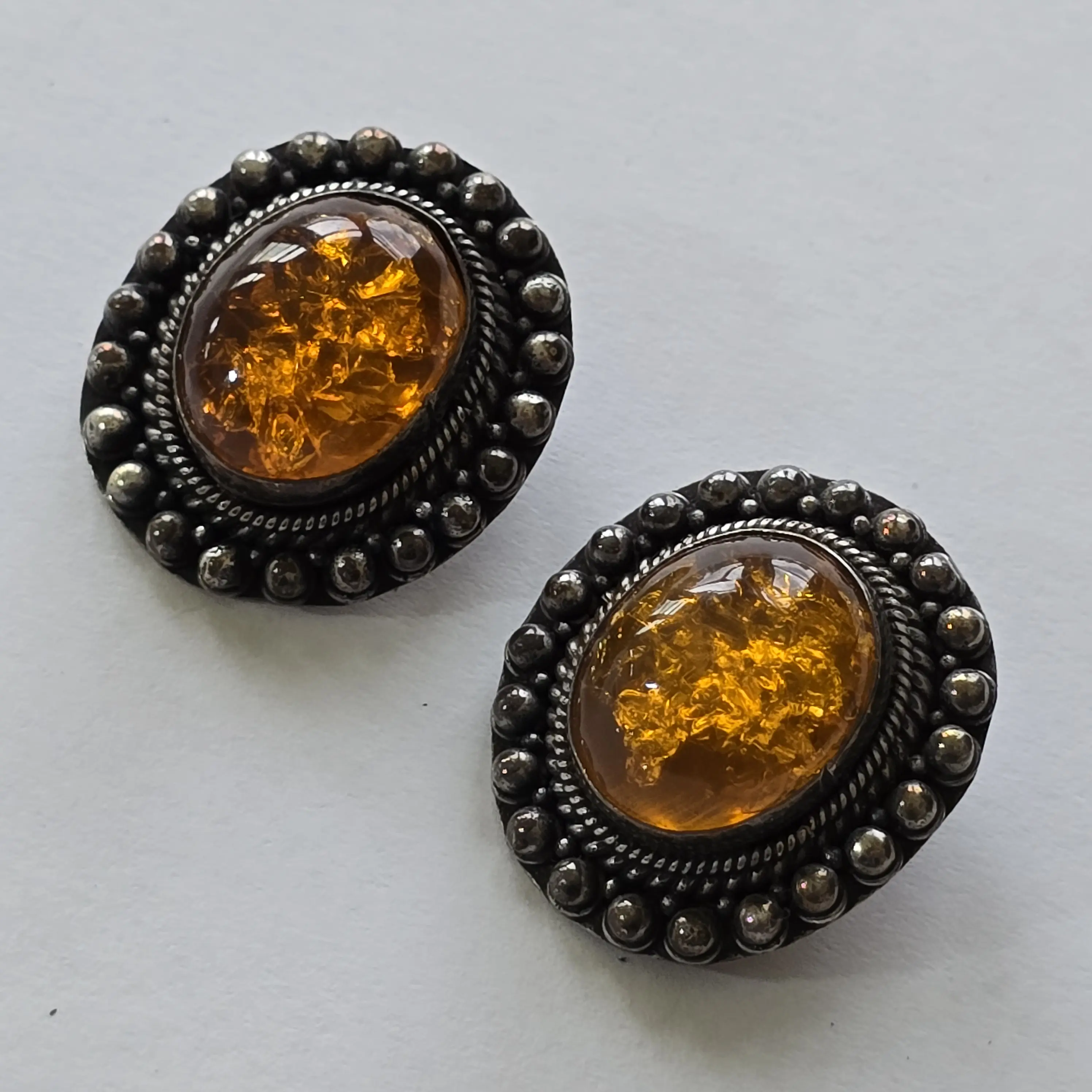 Antique Pair of Sterling Silver Clip-On Earrings with Natural Amber Cabochons