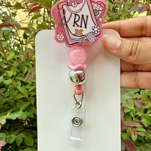 Acrylic Badge Reel with beads live claims. Featuring Variety of Unique Designs and Text Elements