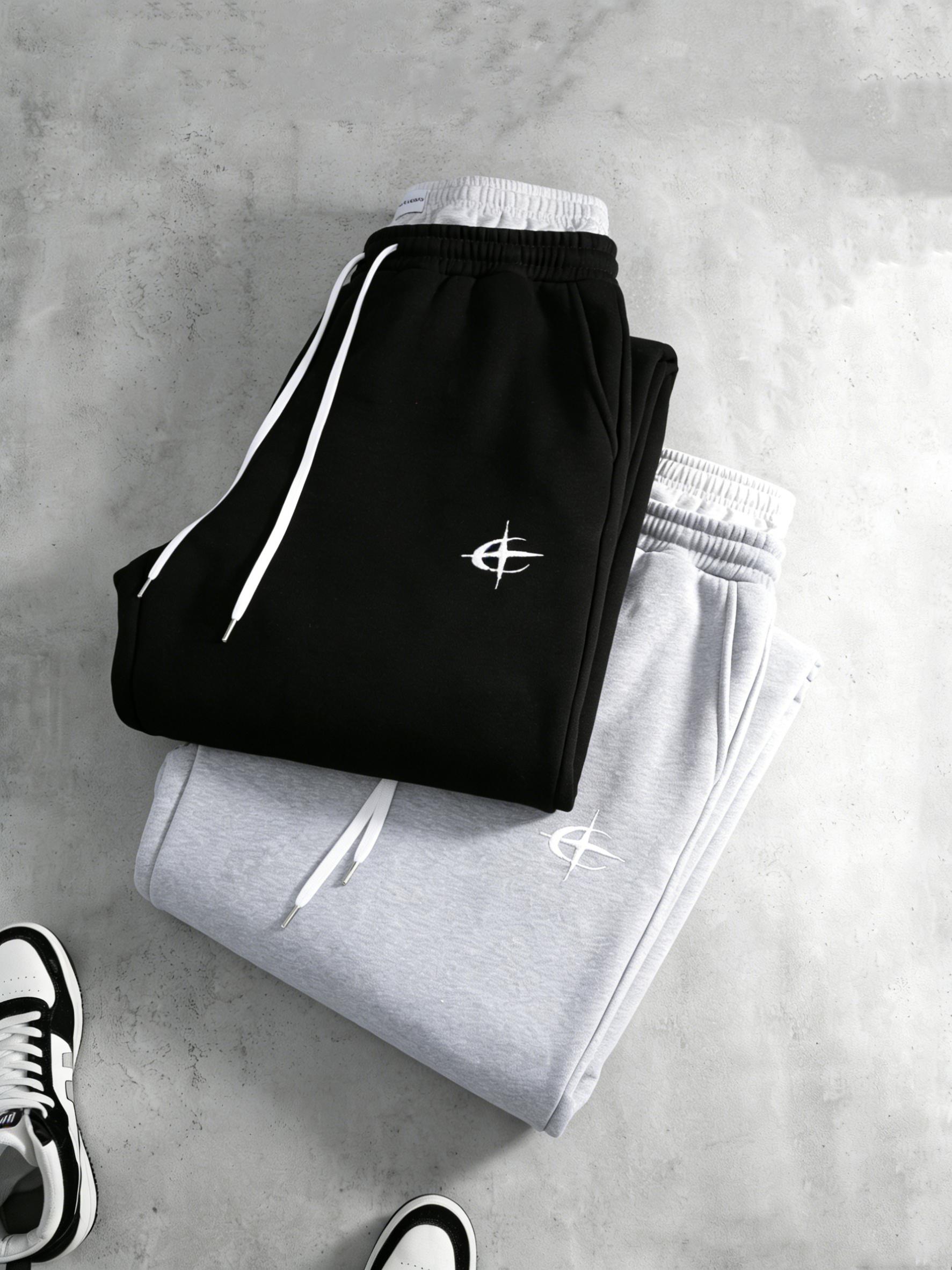 Two-pack unisex Y2K street style joggers, double-waist workout joggers featuring a star print faux two-piece design with contrasting double waistband detailing; loose, casual jogging pants for both men and women, perfect for creating fashionable looks, ve