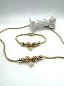 Hermoso set en oro laminado 14k, collar mide 20 pulgadas y pulsera 71/2 pulgadas
