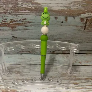 Cute Frog Themed Pen with Green Body and White Bead Detail Perfect for Writing and Office Use