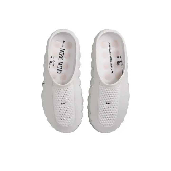 Unisex ivory white monochrome EVA casual slides sculpted ripple thick sole streamlined curved silhouette clean plain tone versatile Streetwear aesthetic All Day Comfort cloud soft cushion matched well with shorts joggers daily casual outfits