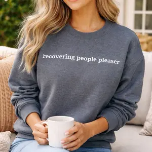 Star’s Shining Gifts Recovering People Pleaser Embroidered Black or Heather Grey Crewneck