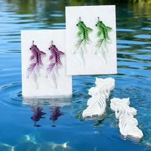 Two exquisite ocean-themed goldfish, Love series Easter jewelry making and cutting DIY polymer clay knives, made of high-quality epoxy resin material, are used as earring soft clay cutters and essential DIY jewelry making tools. They can cut soft clay, re